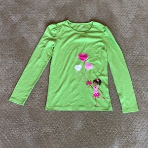 Green long sleeve shirt.